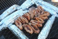 Campfire Pork Chops with Juniper and Raisin Stuffing