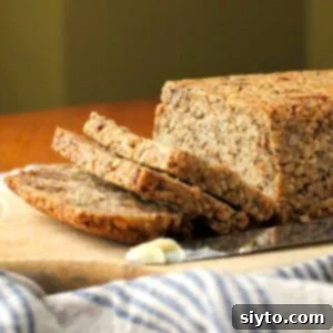 The Loaf That Changes Everything 2 Three slices of the life-changing loaf of bread cut from the loaf.