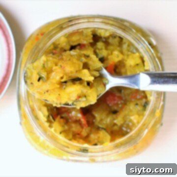 Sweet and Tangy Zucchini Relish: a spoonful of the golden relish, top view