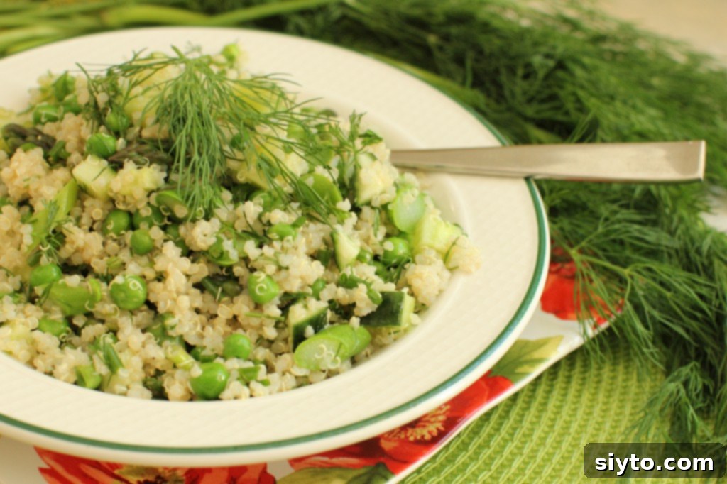 Vibrant Green and White Quinoa Salad with fresh asparagus, cucumber, and peas