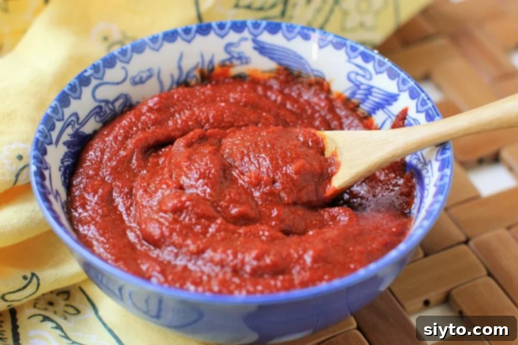 bowl of gochujang with spoon