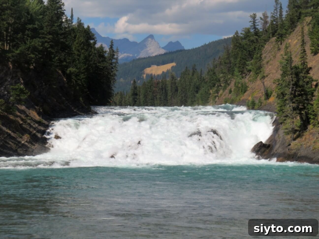 Banff's Best Bites Marinated Flank Steak and Mountain Views 16 Dramatic whitewater of Bow Falls cascading over rocks, a short walk from the Banff Springs Hotel