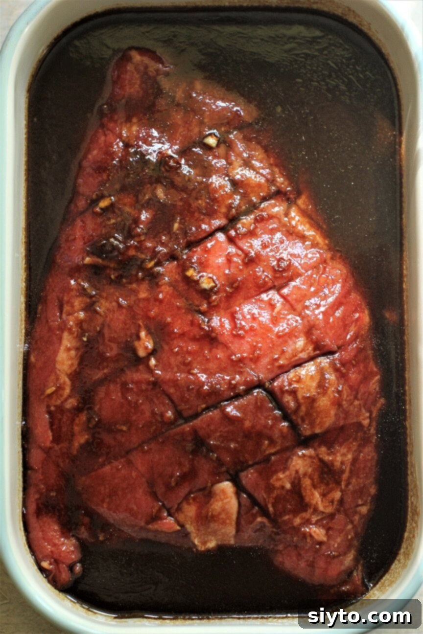 Banff's Best Bites Marinated Flank Steak and Mountain Views 5 Large 2-pound flank steak soaking in a rich, dark marinade, ready for grilling or pan-searing