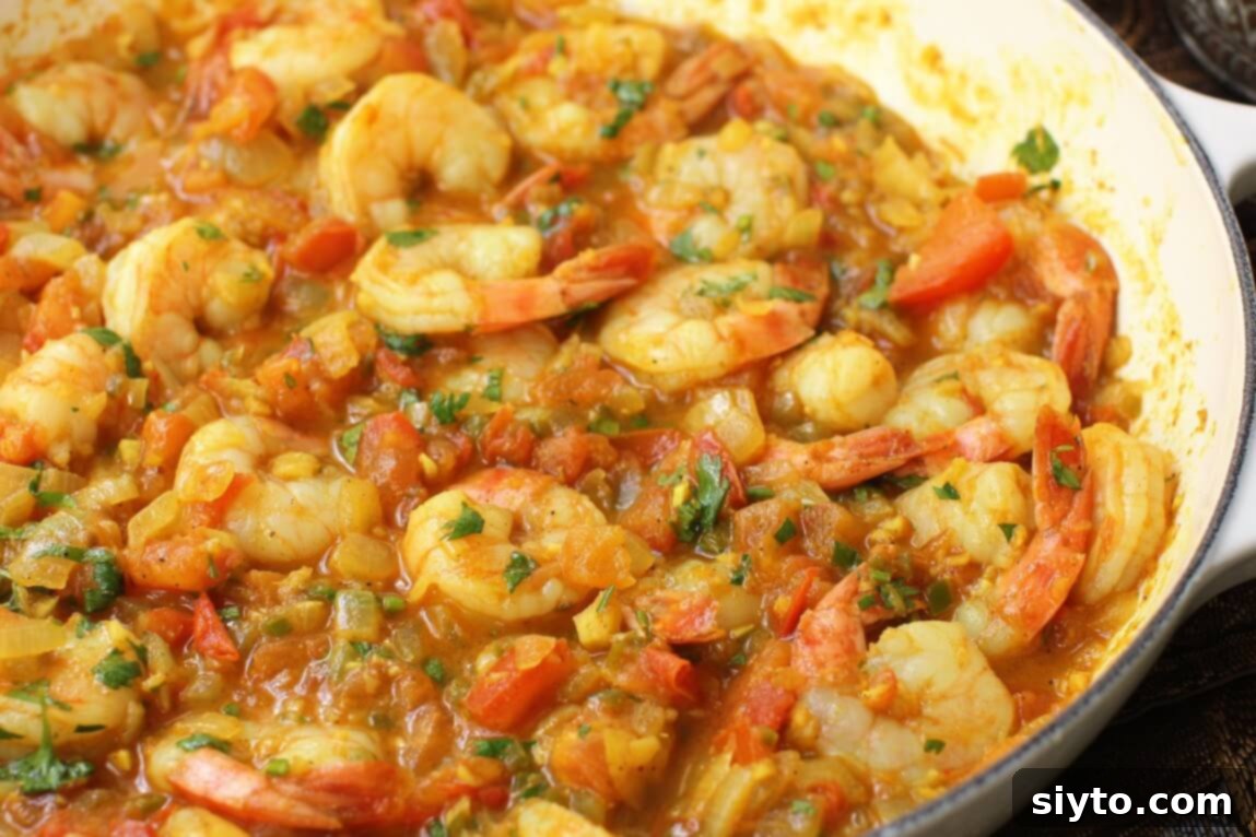 shrimp curry, horizontal view in a pan