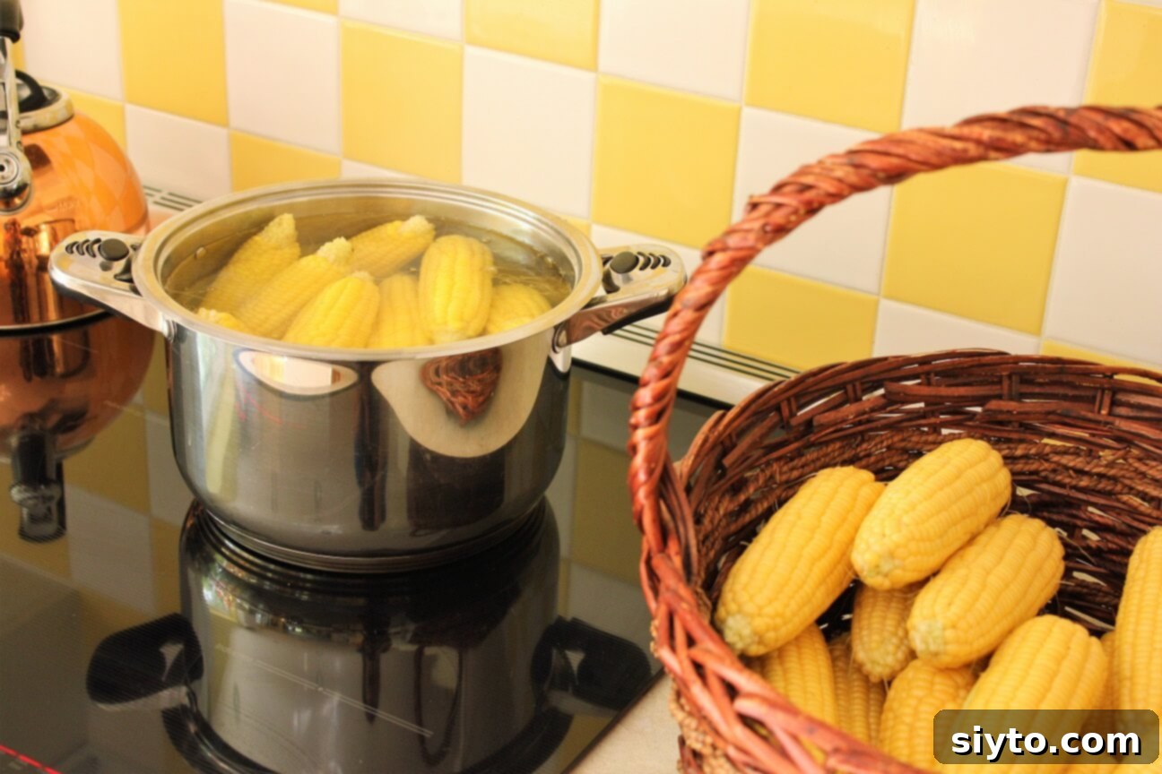 Mısır Nasıl Dondurulur? Koçanlı veya Tane Halinde Doğru Saklama Yöntemleri 6 corn cobs in a pot of boiling water on the stove