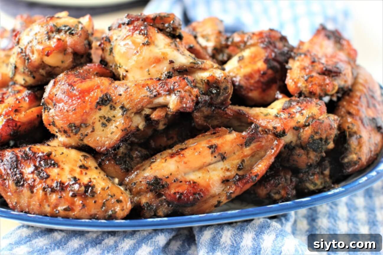 close-up of a plate of Lao grilled chicken wings