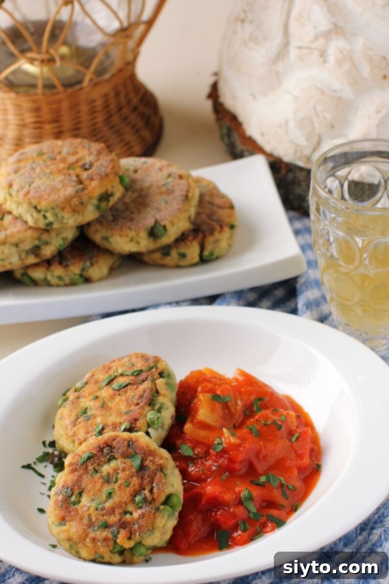 Crispy puffball patties served elegantly with a side of vibrant tomato sauce, highlighting their appetizing appeal.