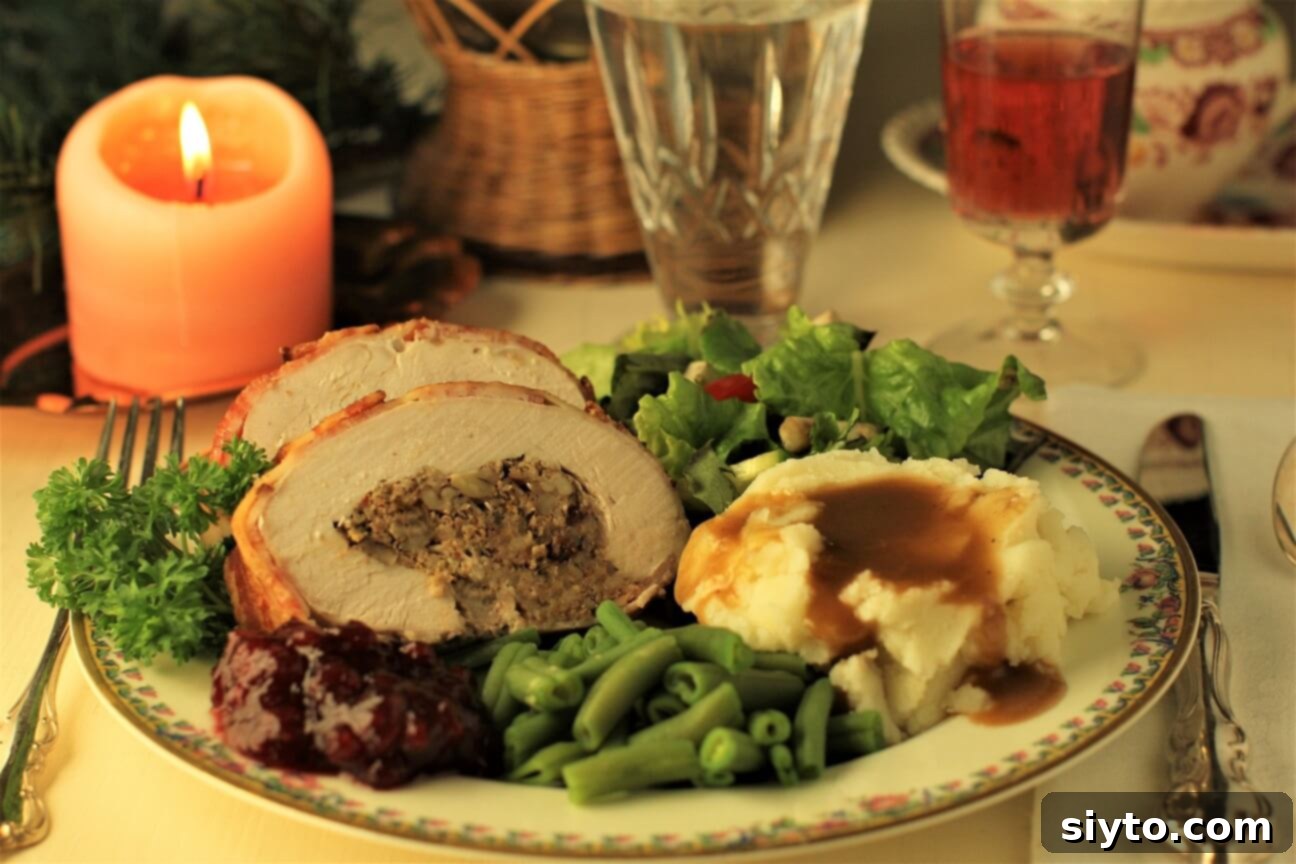 Savory Bacon Wrapped Stuffed Turkey Breast 16 elegant dinner on a plate with candlelight and wine glasses