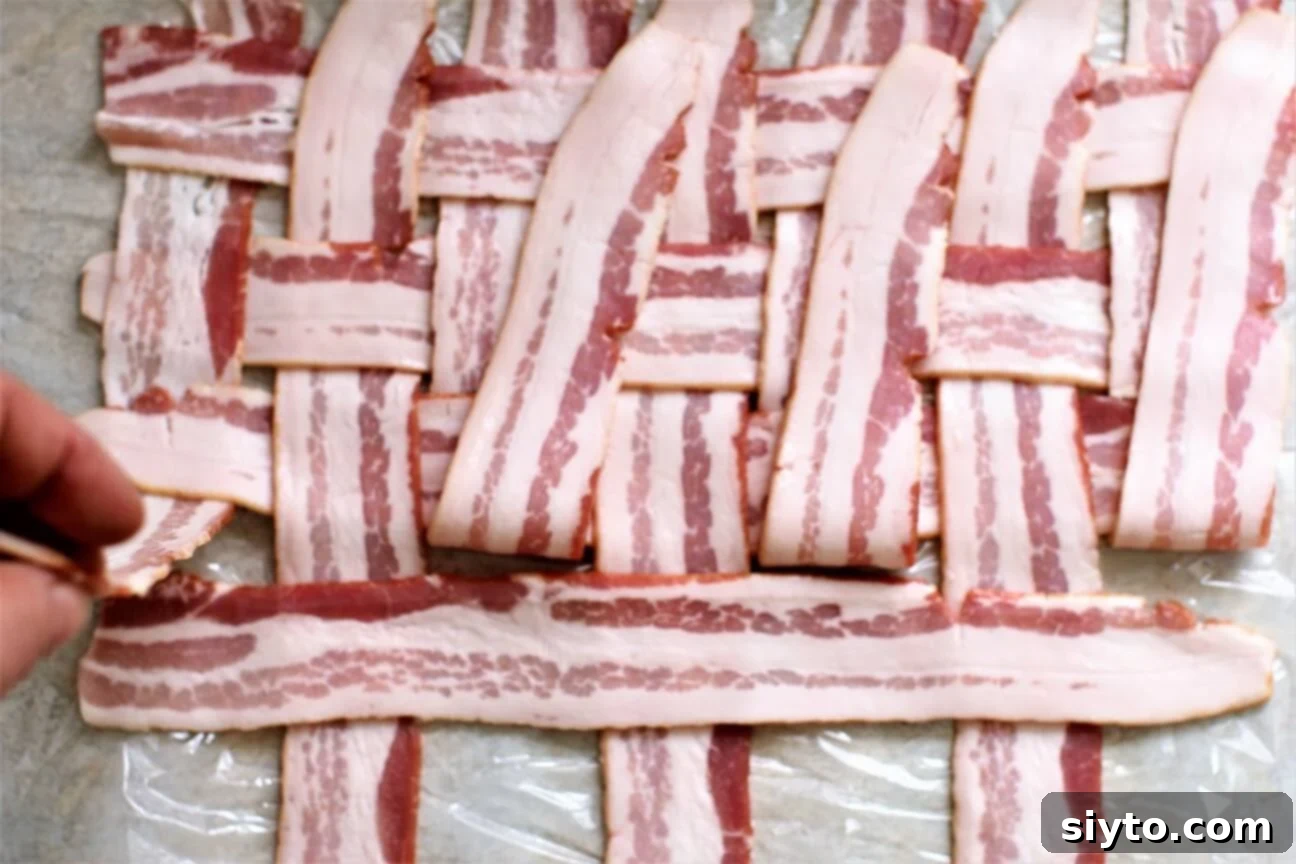 Savory Bacon Wrapped Stuffed Turkey Breast 9 2. keep flipping alternating slices and adding a crosswise strip