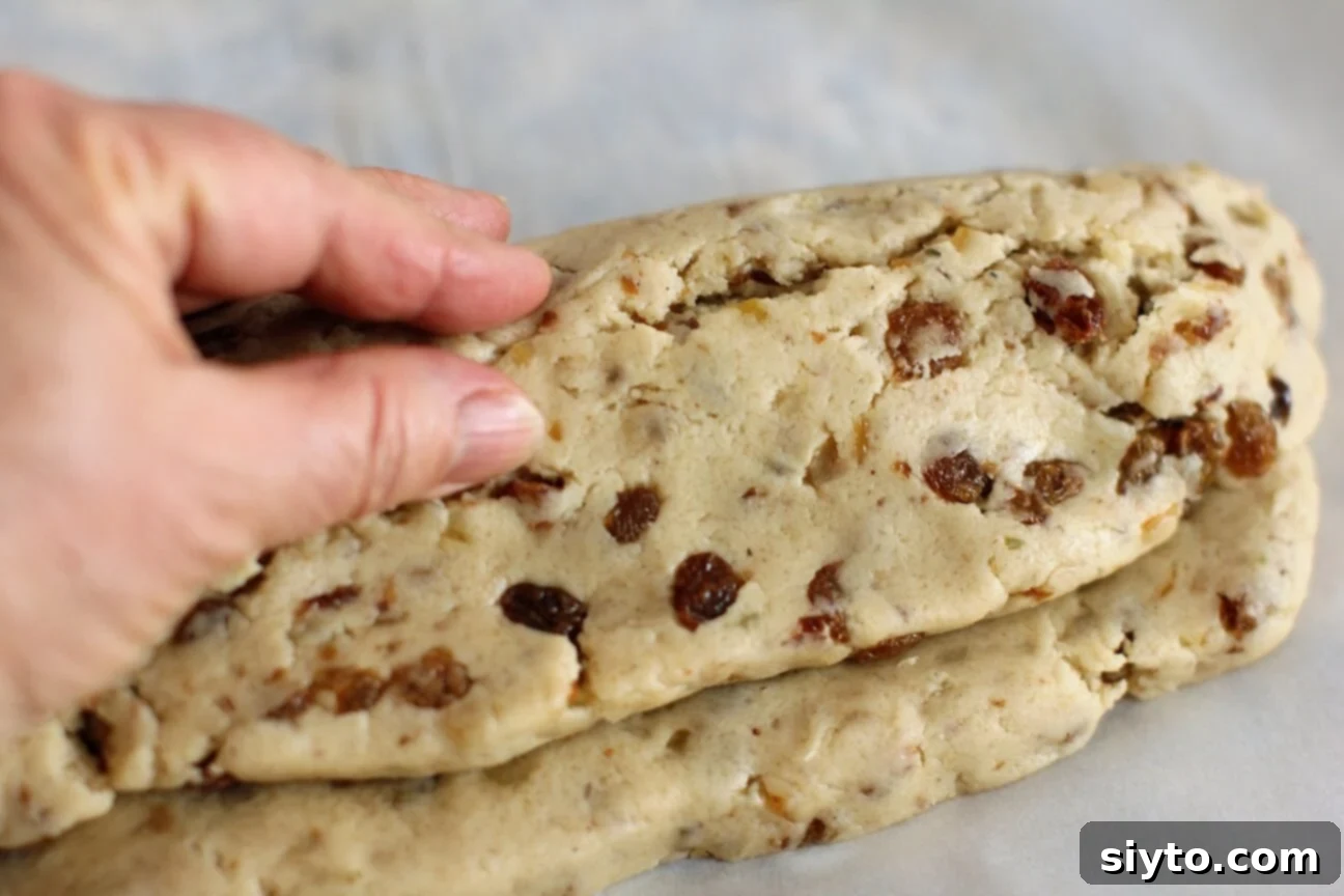 Quarkstollen: The Quicker German Christmas Cake 12 pinching together the cracks in the dough