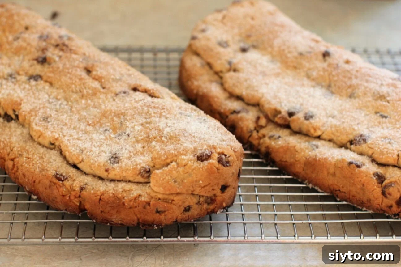 Quarkstollen: The Quicker German Christmas Cake 19 stollen cakes cooling on a rack