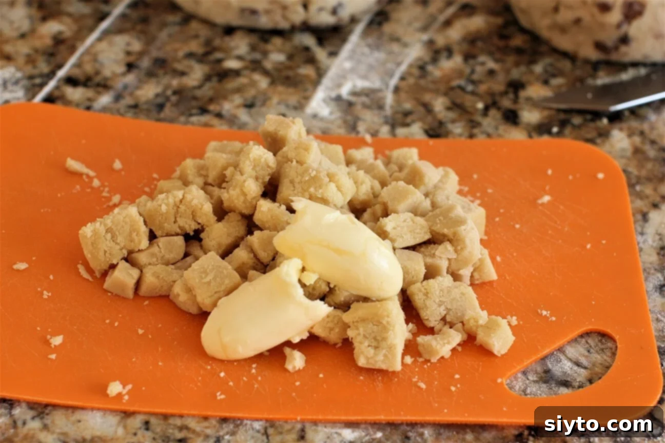 Quarkstollen: The Quicker German Christmas Cake 9 kneading the marzipan with butter