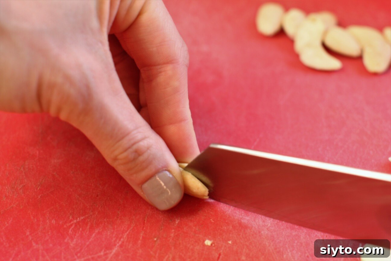 splitting almond with a knife