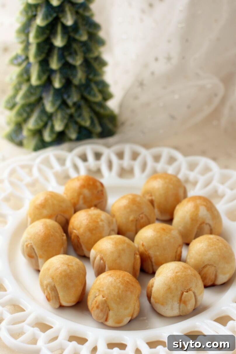 plate of Franfurter Bethmännchen by a pine tree candle
