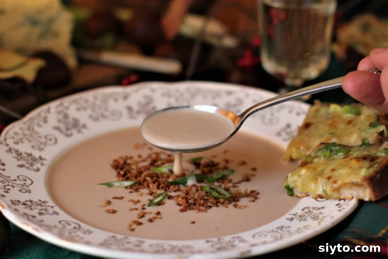 lifting a spoonful of delicate chestnut soup