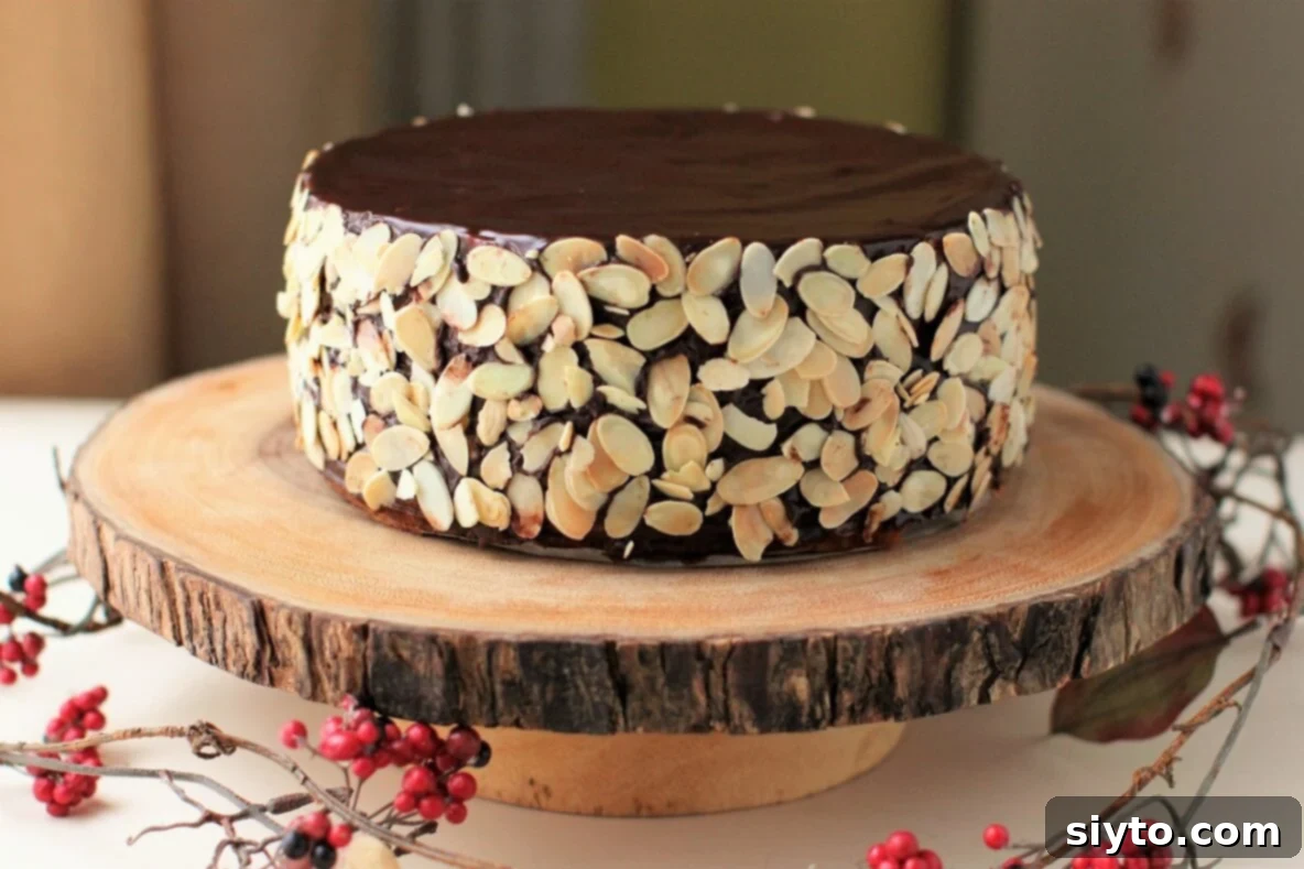 beautiful baumkuchen on a wooden slab cake stand