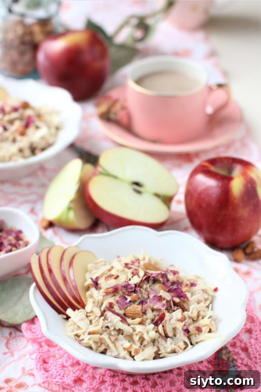 bowl of apple bircher muesli with apples