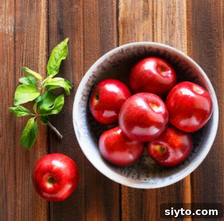 bowl of red, ripe apples