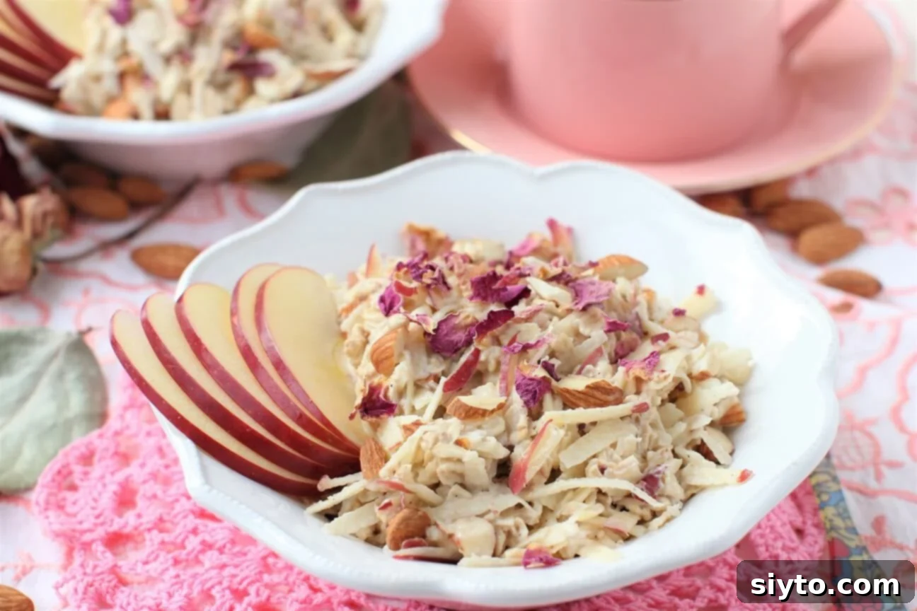 thinly sliced apples on bowl of bircher muesli