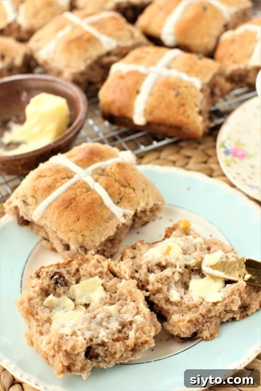 Fluffy Gluten-Free Hot Cross Buns 14 A delicious gluten-free hot cross bun served warm with melting butter, a perfect treat