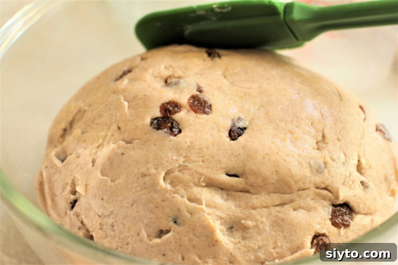 Fluffy Gluten-Free Hot Cross Buns 6 Smooth the top of gluten-free hot cross bun dough with a spatula before covering for its first rise