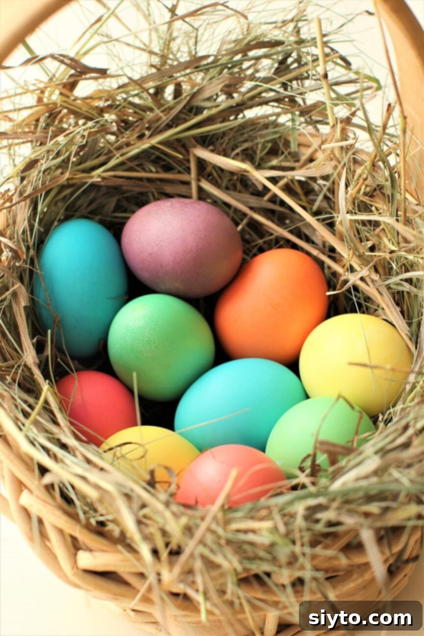 Craft Beautiful Easter Eggs 2 a basket of colored eggs nestled in straw