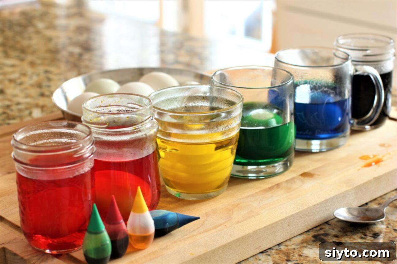 Craft Beautiful Easter Eggs 4 how to dye eggs - row of coloured pots of dye for the eggs
