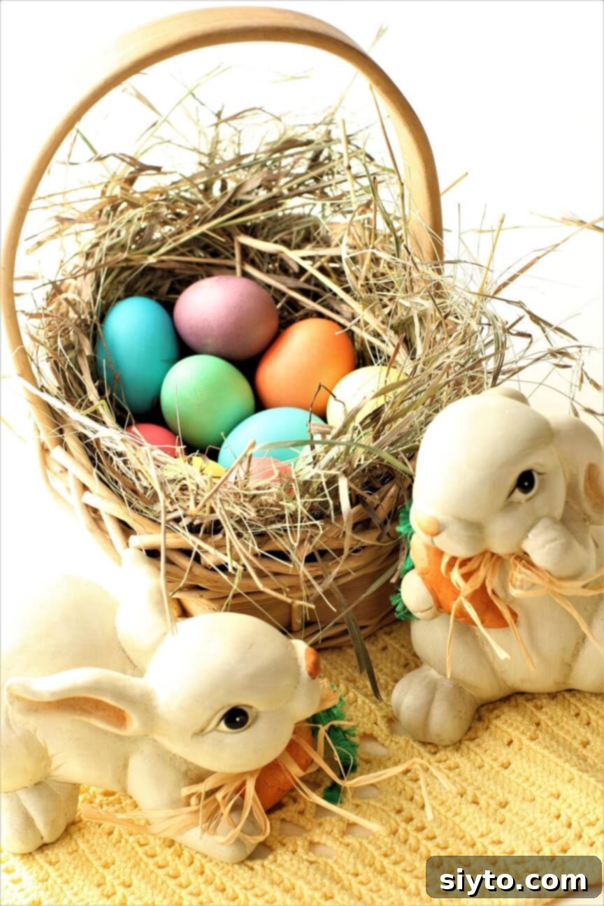 Craft Beautiful Easter Eggs 7 two Easter Bunnies by the basket of coloured eggs