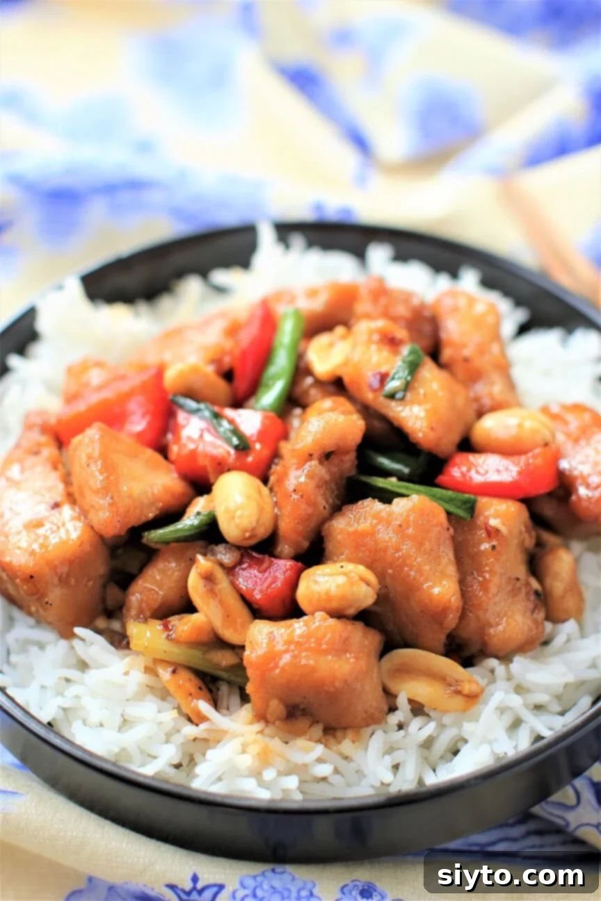 dish of kung pao chicken on blue and yellow cloth