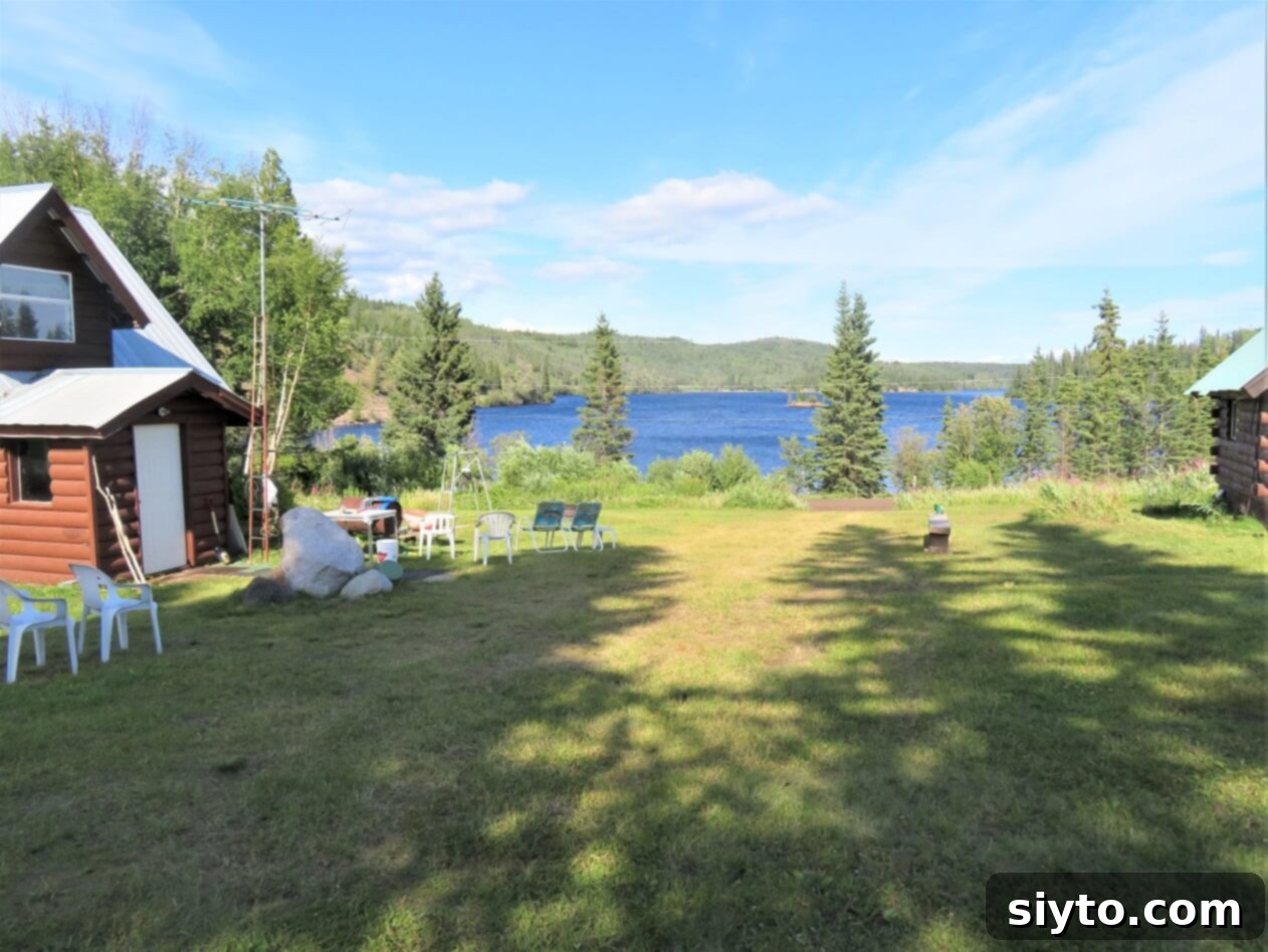 Serene view of François Lake from the cozy cabin, reflecting the peaceful atmosphere of the northern retreat.