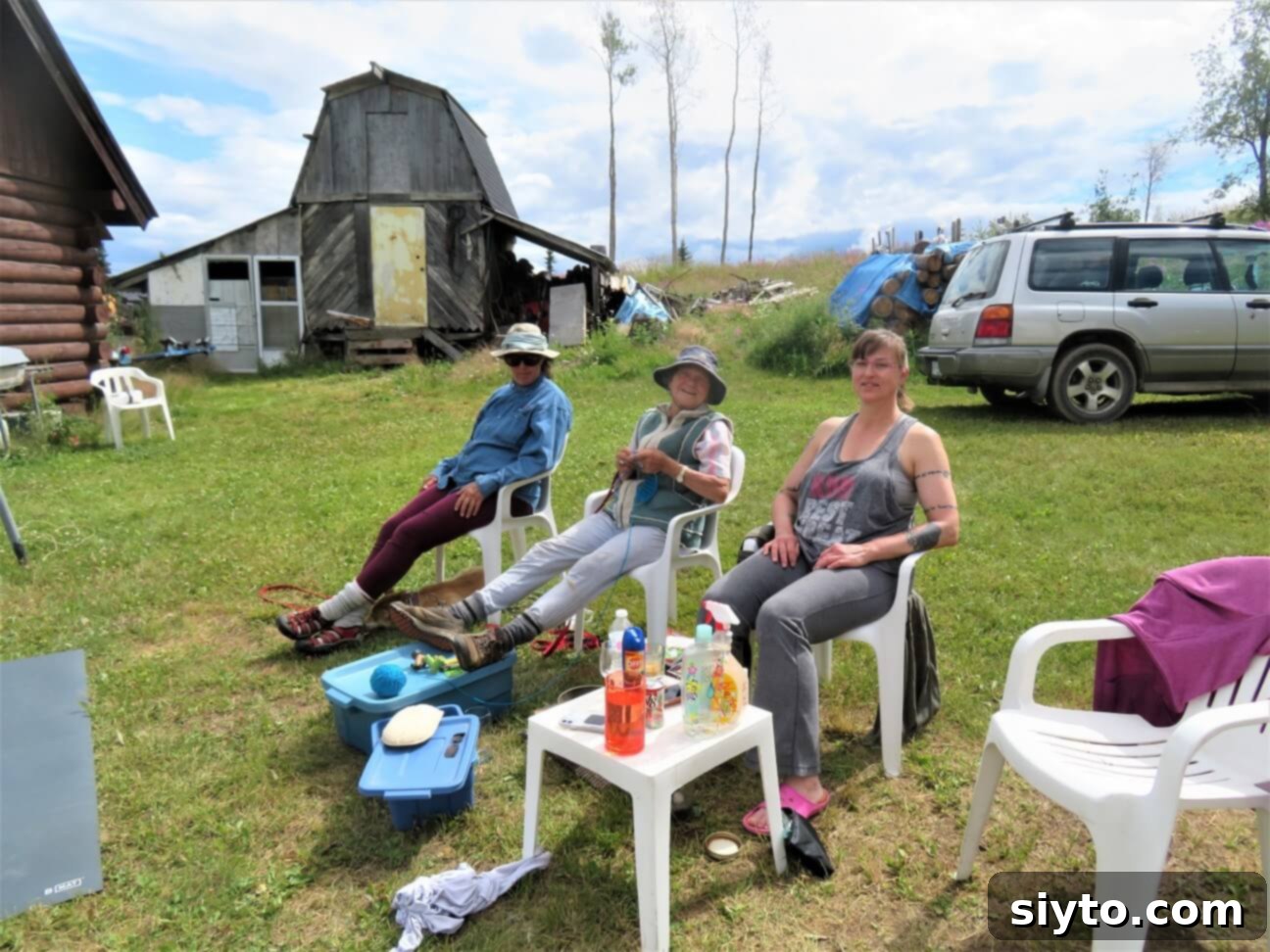 Family members Nancy, Mom, and Adelheid relaxing together, enjoying the peaceful cabin atmosphere and each other's company.