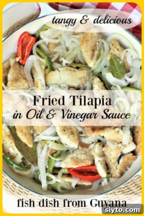 Pinterest banner for Guyanese Fried Tilapia with Oil & Vinegar Sauce, showing the vibrant dish.