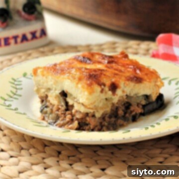 portion of moussaka on a plate - horizontal view