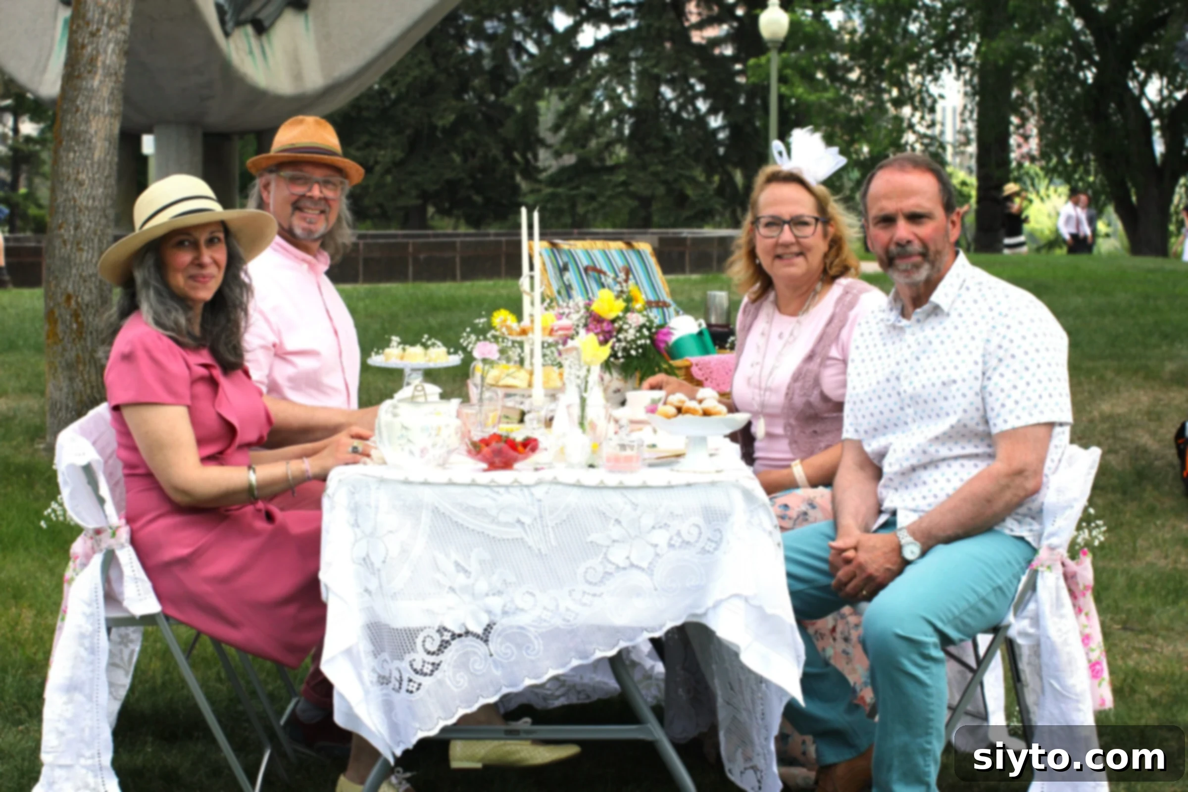 four of us sitting at the table, ready to enjoy afternoon tea, Nicoletta, Loreto, Margaret, Raymond.