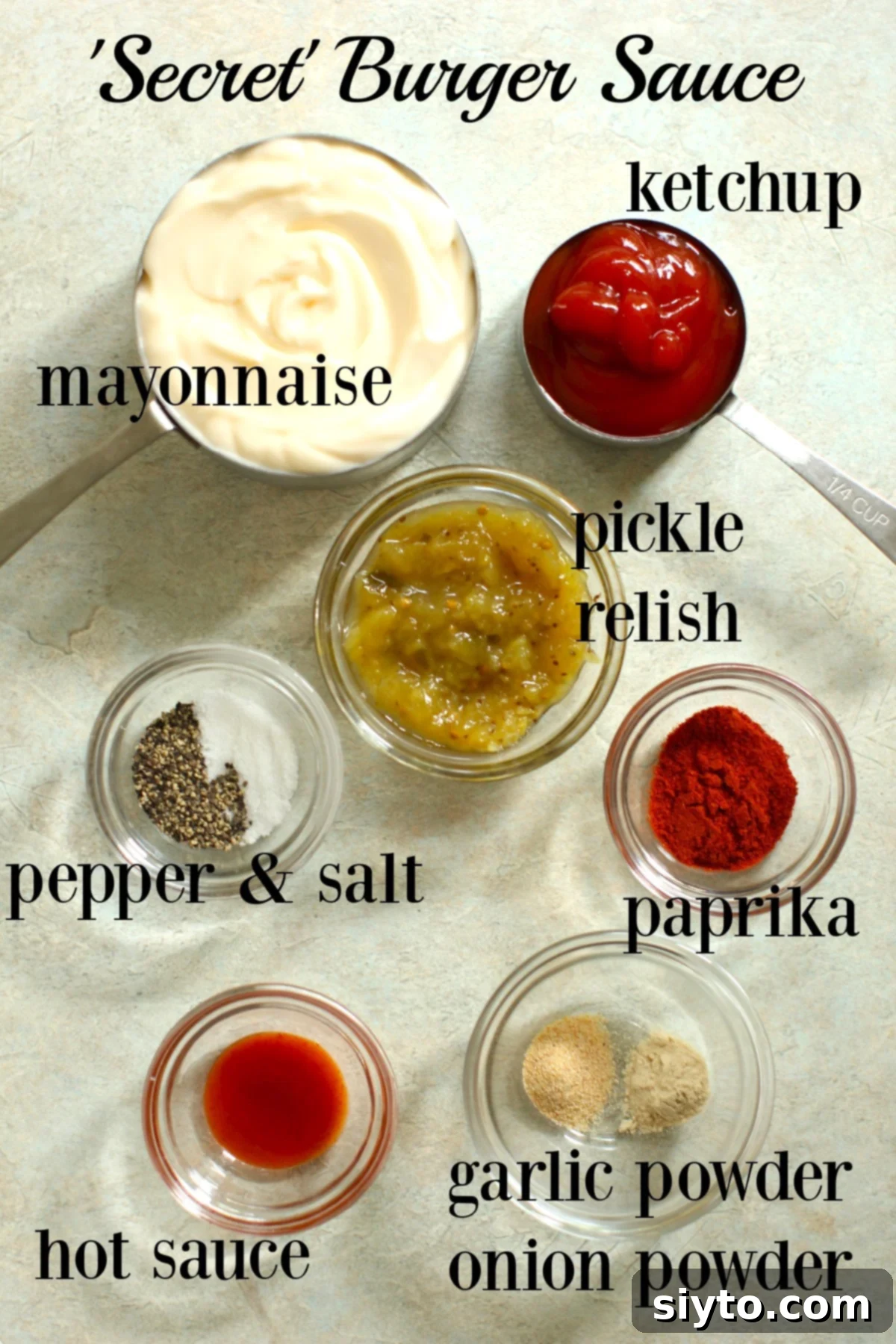 all the ingredients for secret burger Sauce in separate bowls and labeled.