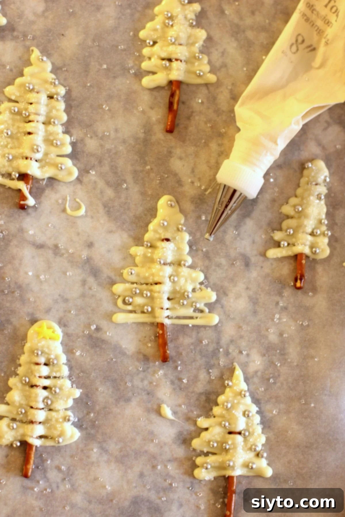 sparkling decorated little mini white chocolate trees.