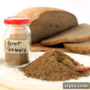 thumbnail photo of mound of German bread spice, jar of Brot Gewürz, loaf of rustic bread.
