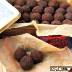 Sweet Bites Snowy Sleds: Lake Louise Adventures 18 Licorice Balls thumbnail, square photo of 3 balls on paper and pan of balls at top.