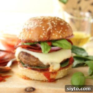 square thumbnail, close-up of loaded pizza burger bun.