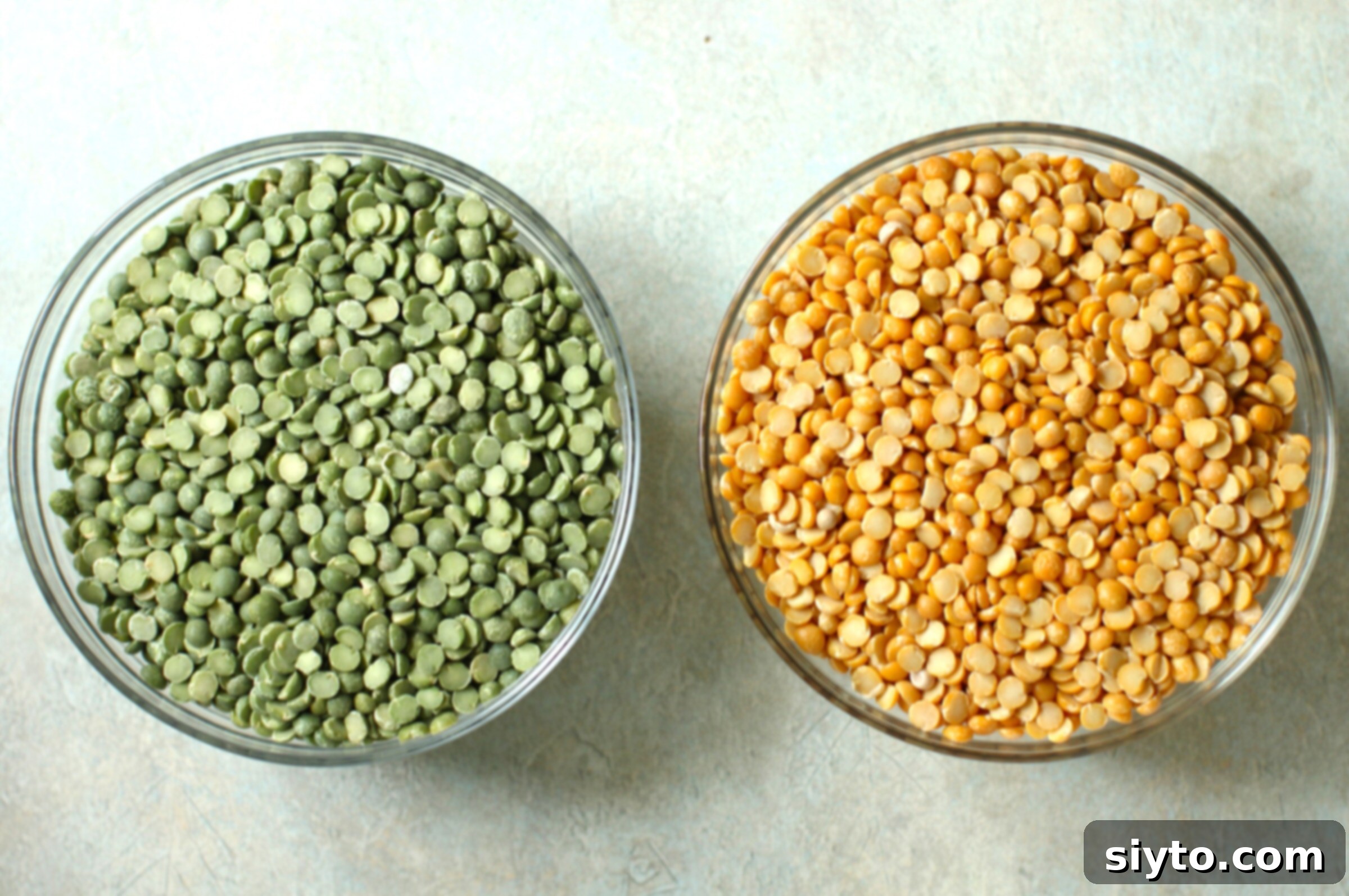 Perfectly Simple Split Pea Soup 4 a bowl of dried green split peas and one of dried yellow split peas.