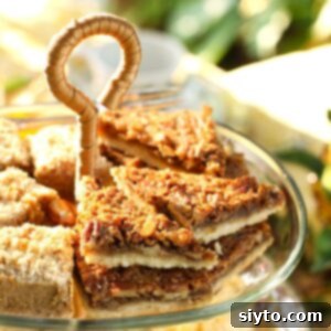 Thumbnail photo showing the top layer of the cake stand with pecan bars on it.