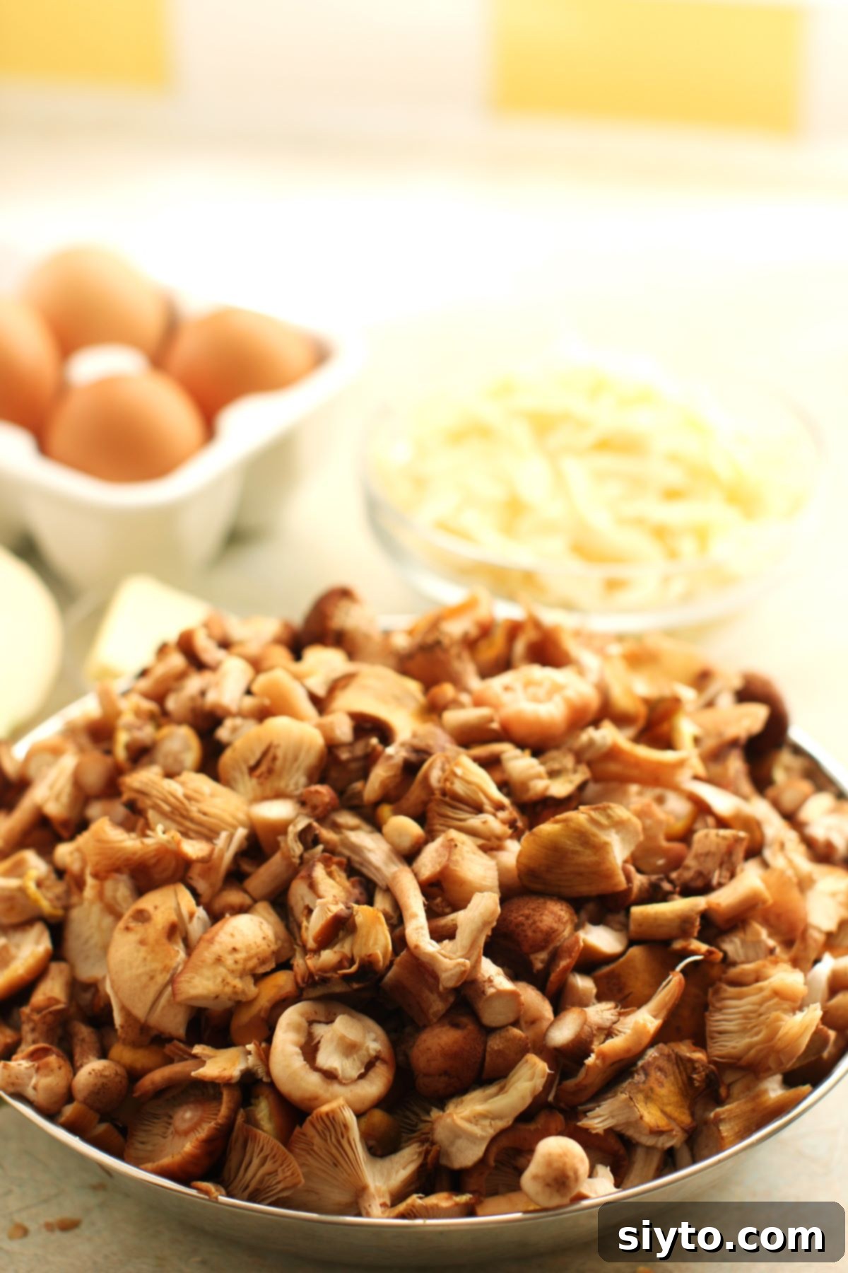 Foraged Fungi Quiche with a Gluten-Free Base 5 a pile of torn honey mushrooms ready to saute for the quiche filling.