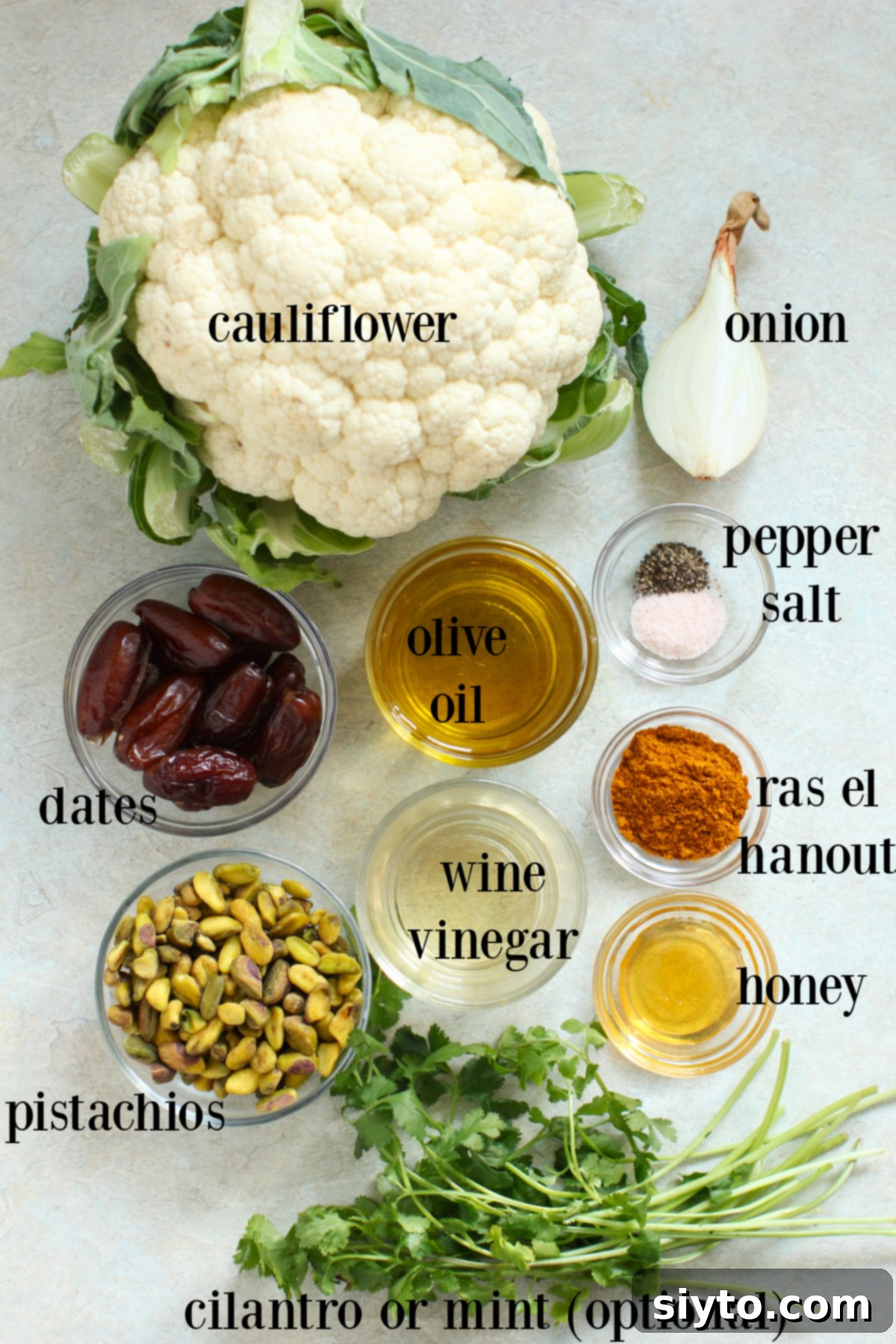 All the ingredients needed for cauliflower salad, labeled.