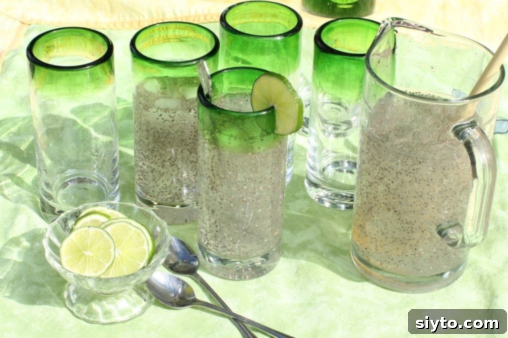 From European Adventures To Summer Sips Chia Limeade 2 Agua de Chia Limeade: a vibrant, refreshing drink with visible chia seeds and lime slices.
