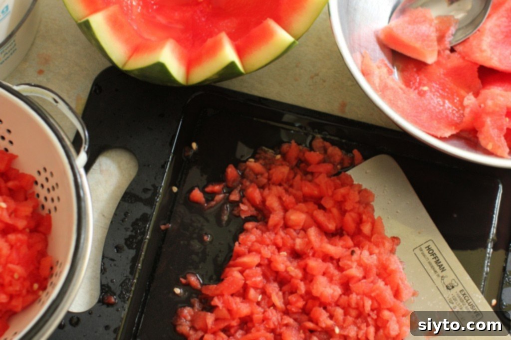 A person expertly chopping watermelon into small, even cubes for the salsa recipe